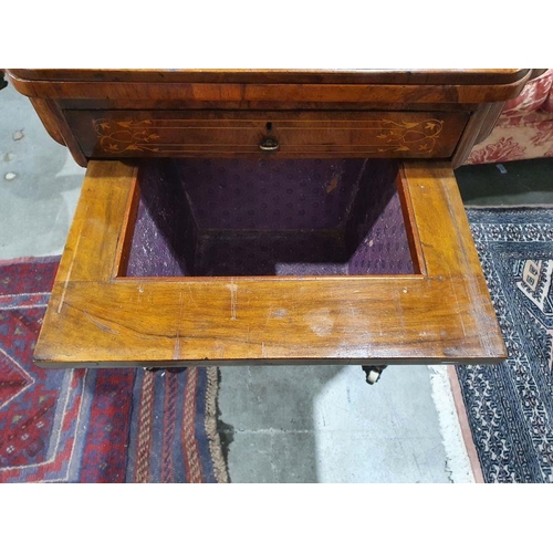 1382 - Early Victorian walnut gaming/work table, the lozenge-shaped top with satinwood inlay, opening to re... 