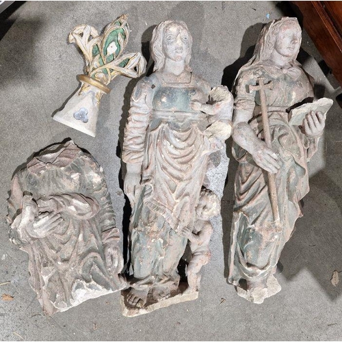 144 - Ecclesiastical interest, Three antique carved and coloured stone part figures of saints (2+1 torso),... 