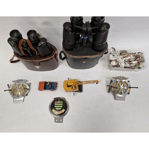 153 - Two pairs of binoculars, two AA badges, quantity of electroplated collector's teaspoons, Dinky Toys ... 