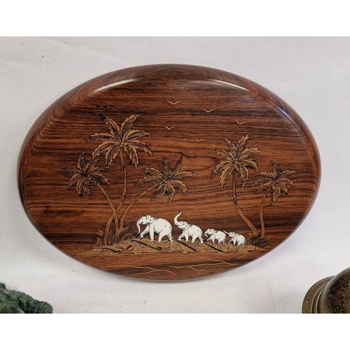 162 - Eastern hardwood oval plaques with inlaid decoration, a witch's ball, two Eastern brass beakers, a G... 