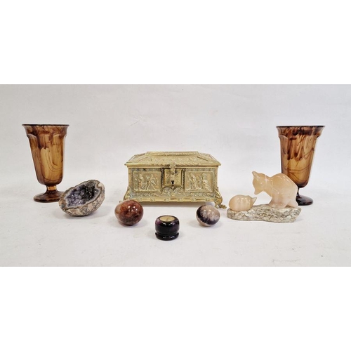 205 - Polished stone eggs, a brass casket and two glass vases of faceted form