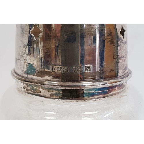 249 - Silver four-section toastrack and glass sugar caster with pierced silver lid (2)
