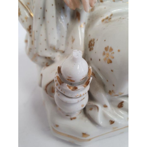 25 - Pair Continental porcelain scent bottle candle holders each of seated figure of an Eastern couple, e... 