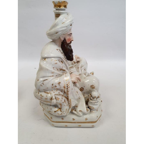 25 - Pair Continental porcelain scent bottle candle holders each of seated figure of an Eastern couple, e... 