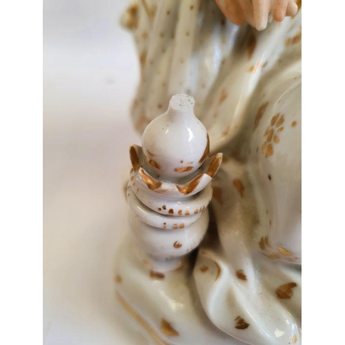 25 - Pair Continental porcelain scent bottle candle holders each of seated figure of an Eastern couple, e... 