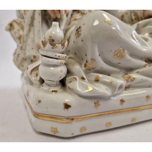 25 - Pair Continental porcelain scent bottle candle holders each of seated figure of an Eastern couple, e... 