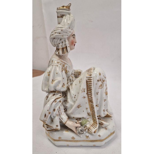 25 - Pair Continental porcelain scent bottle candle holders each of seated figure of an Eastern couple, e... 