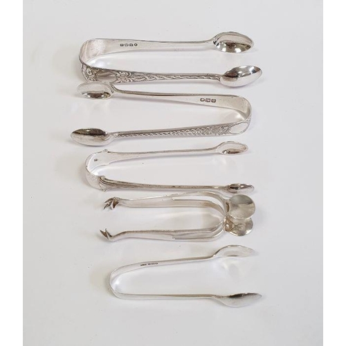 255 - Five assorted sugar tongs to include Edward VII sugar tongs with bright cut decoration, London 1898 ... 