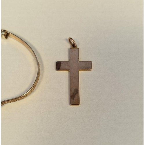 263 - Gold-coloured metal cross pendant, 4.3g approx. and a rolled gold bangle (2)