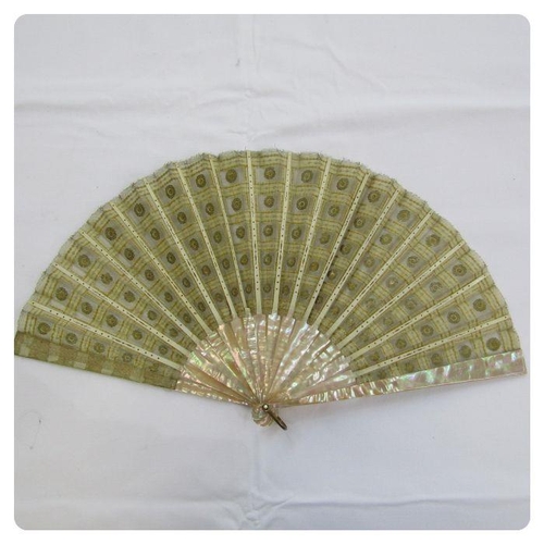 275 - **** WITHDRAWN**** A late 19th Century fan embroidered with silver and gold sequins, mounted on crea... 