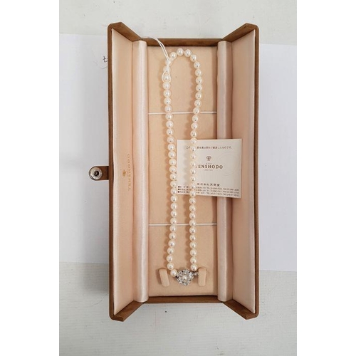 277 - Cultured pearl necklace with silver flowerhead-pattern clasp set single cultured pearl, 40cm long, i... 