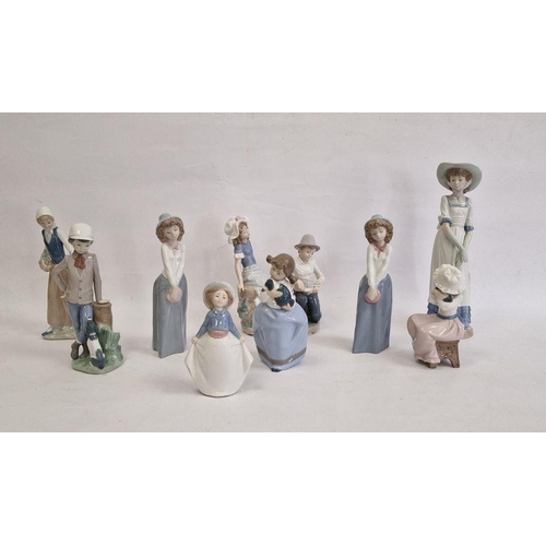 30 - Nao goose girl, Nao boy and cat with dog, Nao group, girl with boy bandaging her foot and six other ... 