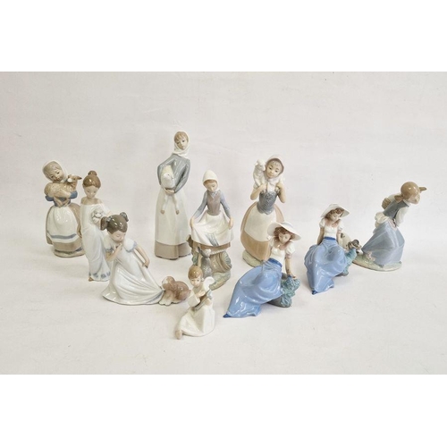 36 - Lladro girl with lamb, another with rabbit, another with puppy in basket and seven various Nao girl ... 