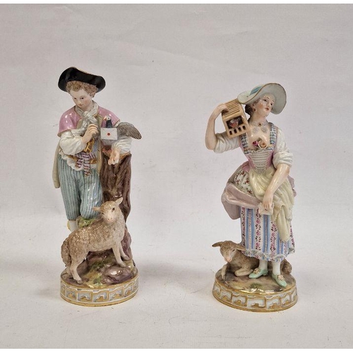 58 - Pair Meissen figures, the lady holding letter, bird in cage on her shoulder and lamb at her feet, we... 