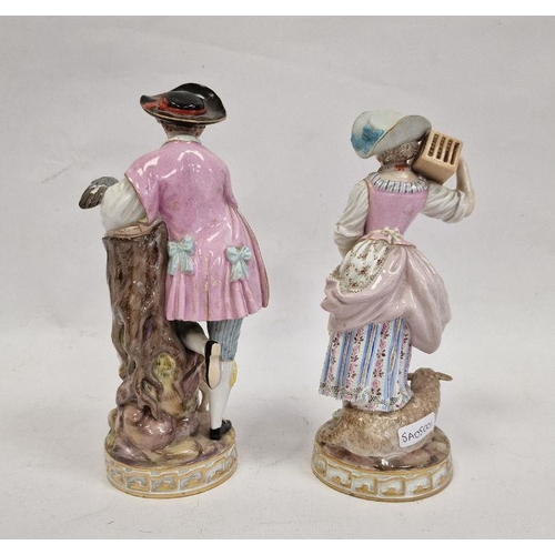 58 - Pair Meissen figures, the lady holding letter, bird in cage on her shoulder and lamb at her feet, we... 