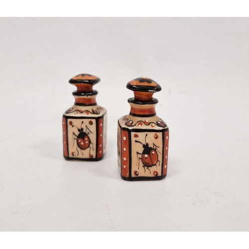 76 - Pair miniature porcelain scent bottles and stoppers, each square and painted with insects and lady i... 