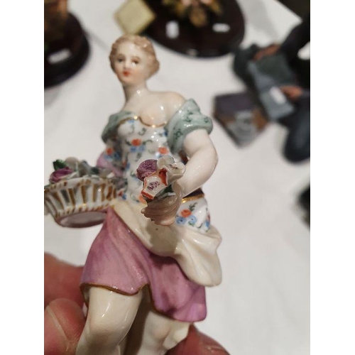 87 - 19th century Meissen porcelain figure of classical maiden with basket of flowers, 13cm high and Roya... 