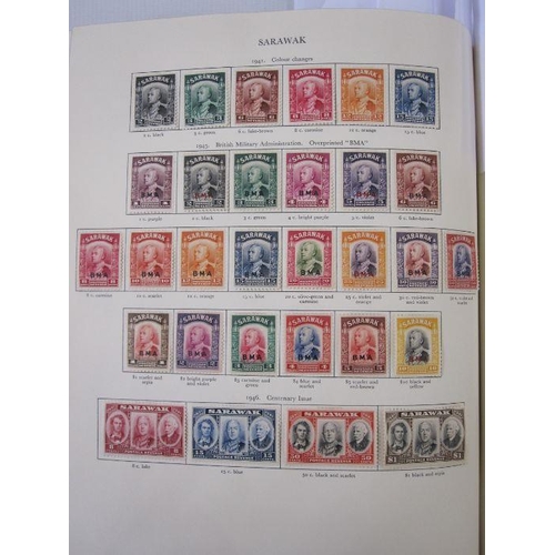 234 - Purposed, 220 page, interleaved red SG 'King George VI' stamp album, 1964 edition, c98% complete.  D... 