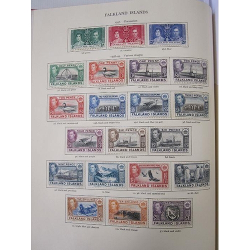 234 - Purposed, 220 page, interleaved red SG 'King George VI' stamp album, 1964 edition, c98% complete.  D... 