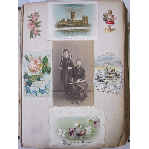 300 - Victorian scrap album containing Victorian scraps, greeting cards to include Christmas and New Year,... 