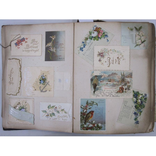 300 - Victorian scrap album containing Victorian scraps, greeting cards to include Christmas and New Year,... 