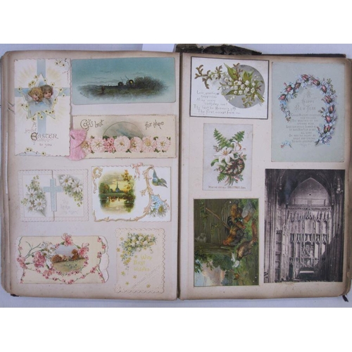 300 - Victorian scrap album containing Victorian scraps, greeting cards to include Christmas and New Year,... 