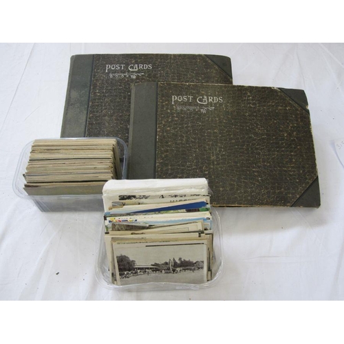 313 - Two albums of vintage postcards, topographical and other and a quantity of loose similar postcards (... 