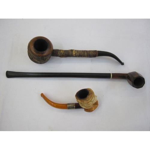 323 - Small brass four-draw telescope with leather case, a Meerschaum silver and amber pipe in the form of... 