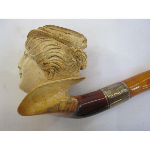 323 - Small brass four-draw telescope with leather case, a Meerschaum silver and amber pipe in the form of... 