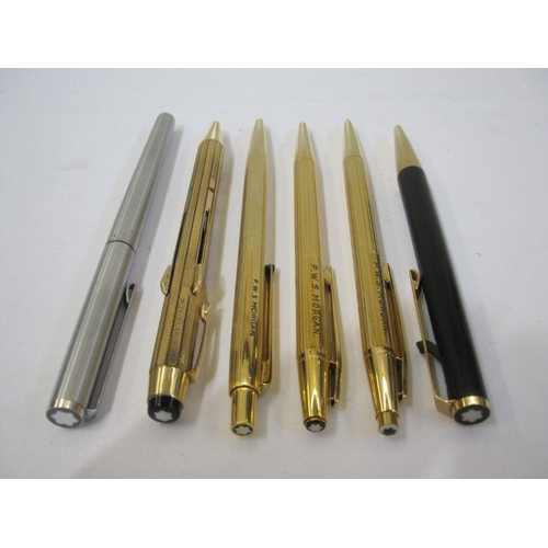 325 - Mont Blanc stainless steel rollerball pen, four gilt metal Mont Blanc pens including a multi-coloure... 