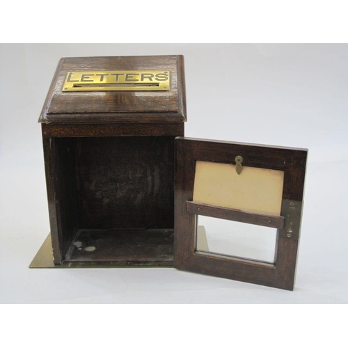 333 - Edwardian brass-mounted manor house letterbox, the sloping front with pierced brass letter aperture,... 