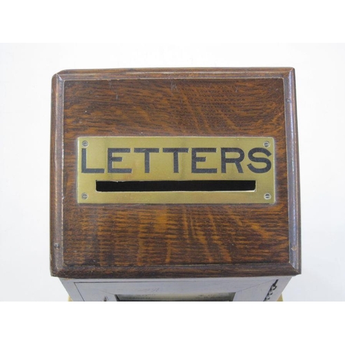 333 - Edwardian brass-mounted manor house letterbox, the sloping front with pierced brass letter aperture,... 