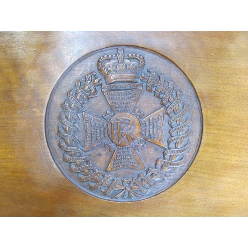 383 - Mahogany table with the badge of the Rajputana Rifles carved into the surface