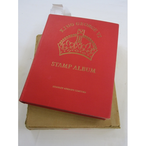 234 - Purposed, 220 page, interleaved red SG 'King George VI' stamp album, 1964 edition, c98% complete.  D... 