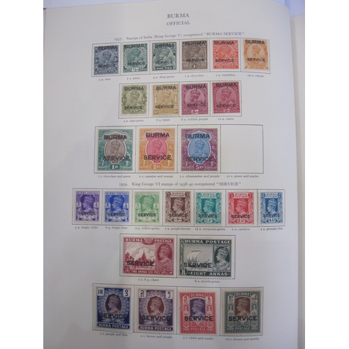 234 - Purposed, 220 page, interleaved red SG 'King George VI' stamp album, 1964 edition, c98% complete.  D... 