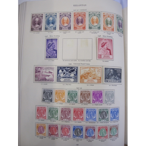 234 - Purposed, 220 page, interleaved red SG 'King George VI' stamp album, 1964 edition, c98% complete.  D... 