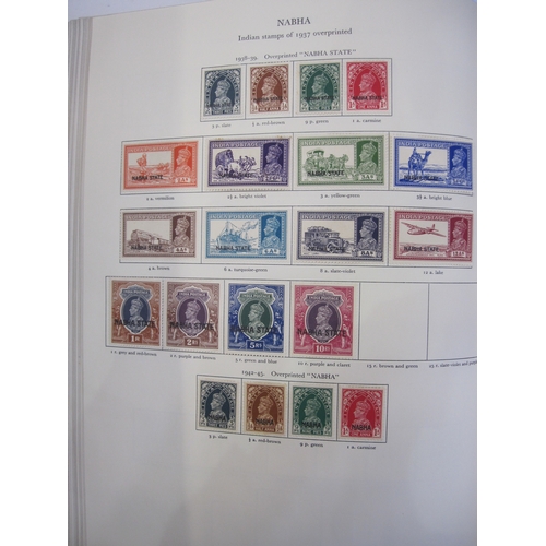 234 - Purposed, 220 page, interleaved red SG 'King George VI' stamp album, 1964 edition, c98% complete.  D... 