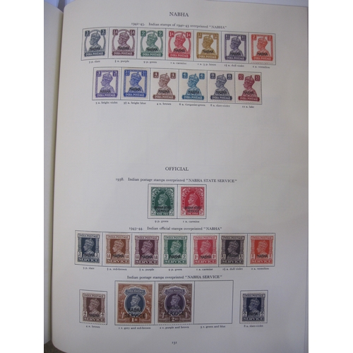 234 - Purposed, 220 page, interleaved red SG 'King George VI' stamp album, 1964 edition, c98% complete.  D... 