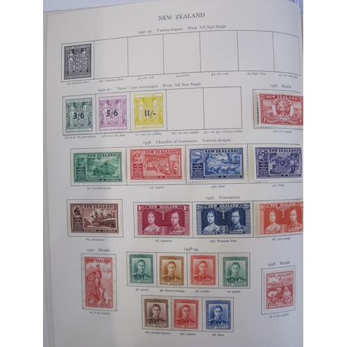 234 - Purposed, 220 page, interleaved red SG 'King George VI' stamp album, 1964 edition, c98% complete.  D... 