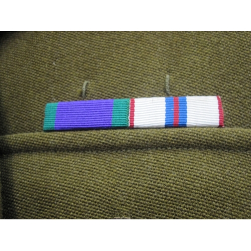 389 - Number two uniform consisting of two jackets and one pair of trousers belonging to Major, The Honour... 