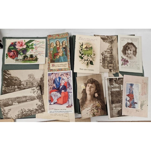 142 - Two vintage postcard albums containing postcards from the 19th and 20th centuries, a Victorian photo... 