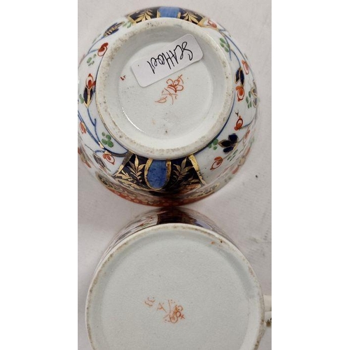 18 - Early 19th century Derby imari pattern trio, viz:- coffee cup, teacup and saucer, and matching shall... 