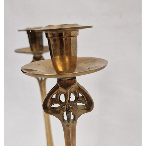 188 - Pair of Art Nouveau brass candlesticks with shaped square pierced bases