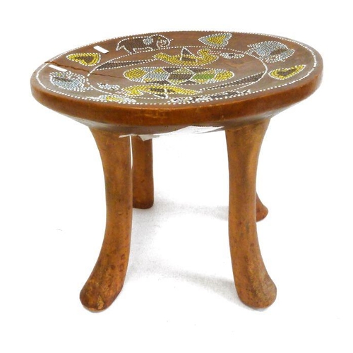 215 - Three African stools,one beaded animal decoration to the seat, one with reeded seat and one further.