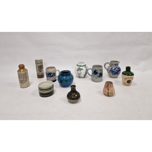 32 - Three German stoneware items, a Cinqueport pottery cylindrical vase (damaged), a small Prinknash vas... 