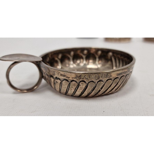 348 - Antique French silver-coloured metal tastevin of typical form with gadrooned sides, circa 1830 and i... 