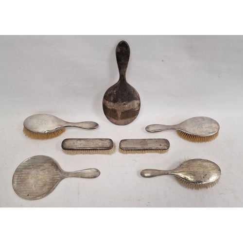 374 - Various silver-backed dressing table mirrors and brushes, various makers marks and styles (7)