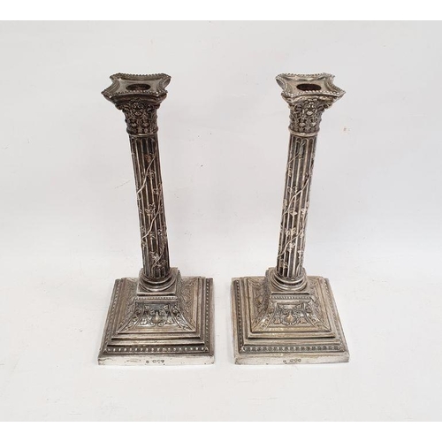 400 - Pair Victorian silver table candlesticks, each of corinthian column form and applied with trailing v... 