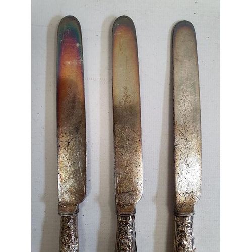 421 - Set of five silver-handled fruit knives and forks with embossed berry on vine decoration to the hand... 