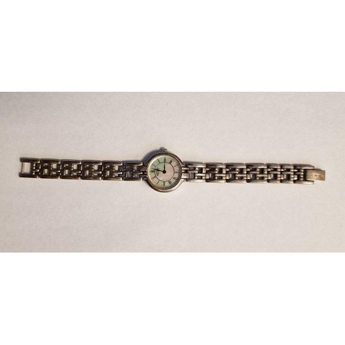 434 - Rotary silver-cased lady's wristwatch, with mother-of-pearl dial, Roman numerals, on a silver link b... 